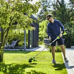 Front Page -Flymo Shop greenworks tools 48v 2 x 24v line trimmer 33cm 13 includes 2 x 24v 2ah batteries charger6952909064994 02c MP